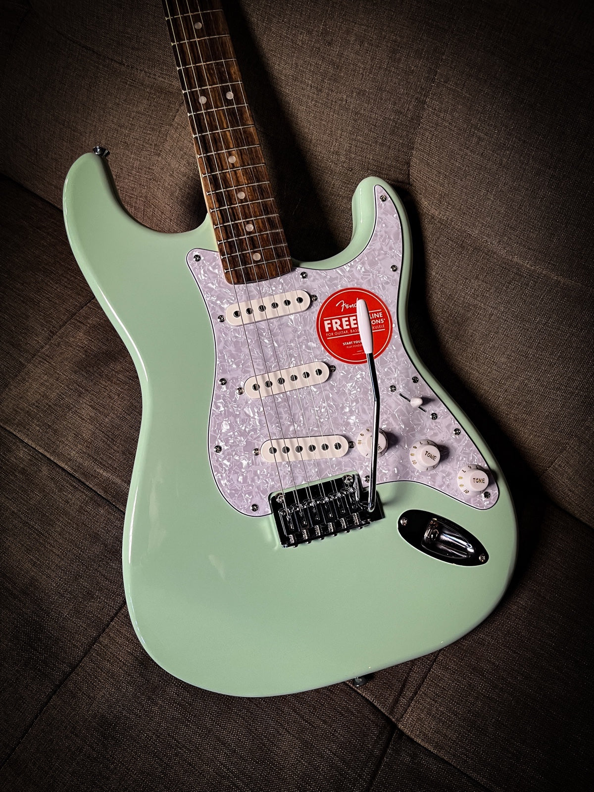 Squier FSR Affinity Series Stratocaster Guitar w/White Pearloid Pickguard,Laurel FB, Surf